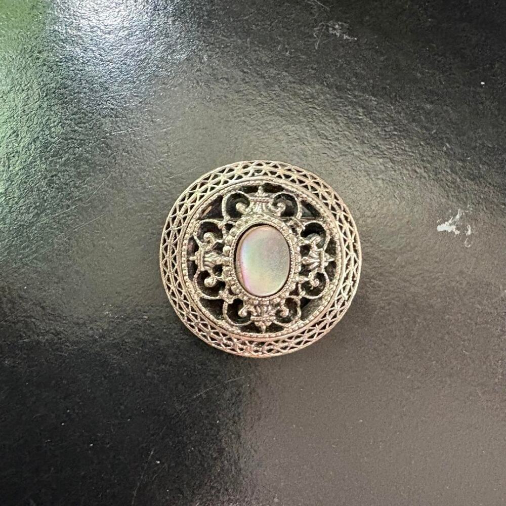 Vintage Silver brooch with ornate filigree